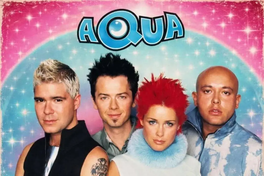 Anggota band AQUA, (dari kiri) Søren Rasted (Gitar), Claus Norreen (Gitar), Lene Nystrøm Rasted (Vokal), dan René Dif (Vokal)