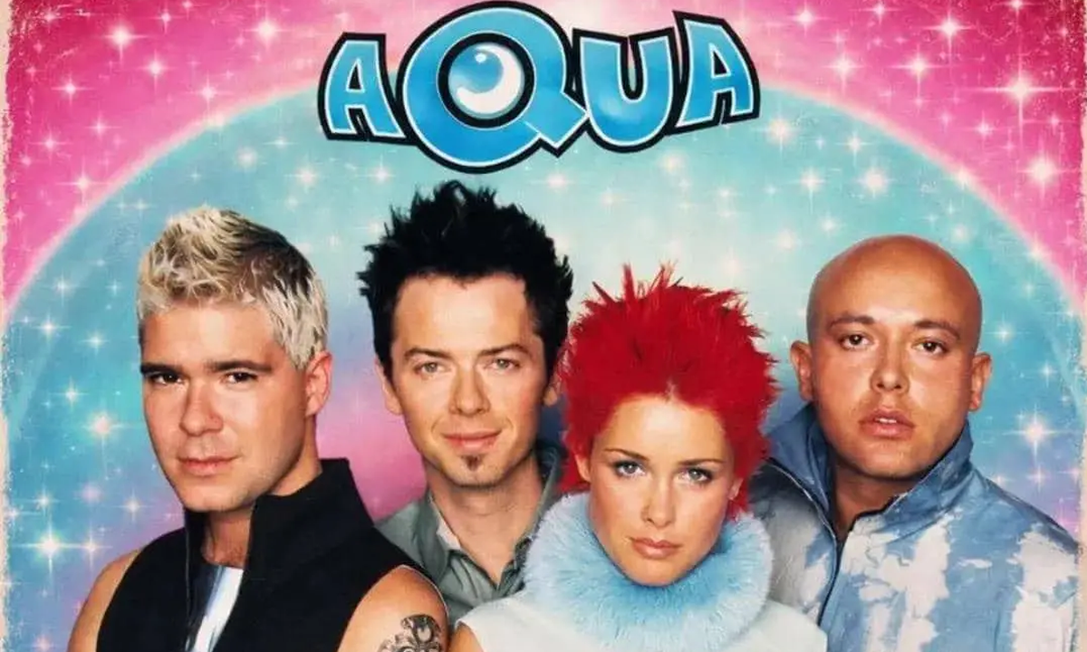 Anggota band AQUA, (dari kiri) Søren Rasted (Gitar), Claus Norreen (Gitar), Lene Nystrøm Rasted (Vokal), dan René Dif (Vokal)