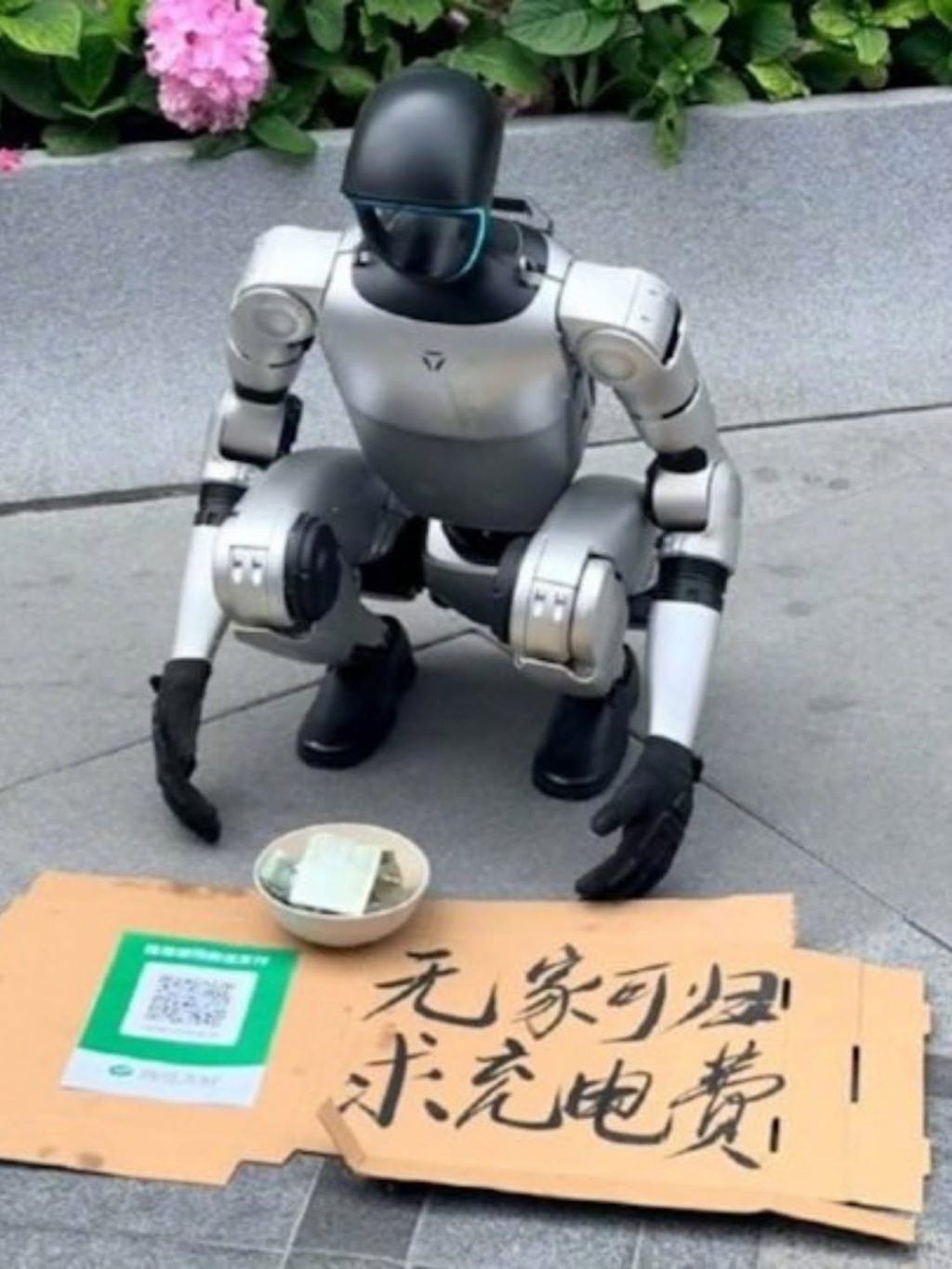 Sebuah robot humanoid di Kota Chengdu, China, menjadi sorotan setelah terlihat meminta uang (Tangkapan Layar)