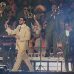 Artis Puerto Rico Bad Bunny tampil selama tur “DeBÍ TiRAR MáS FOToS” di Mexico City pada hari Rabu, 10 Desember 2025. (Kredit foto: Eduardo Verdugo, The Associated Press)